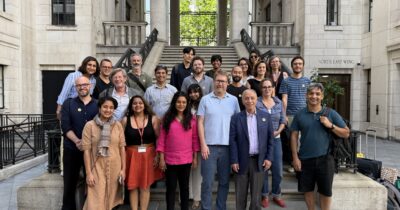 Attendees standing for a group photo